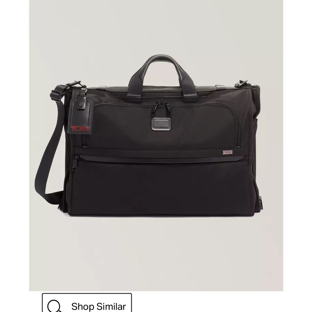 Tumi Black Tri Fold Carry On Bag